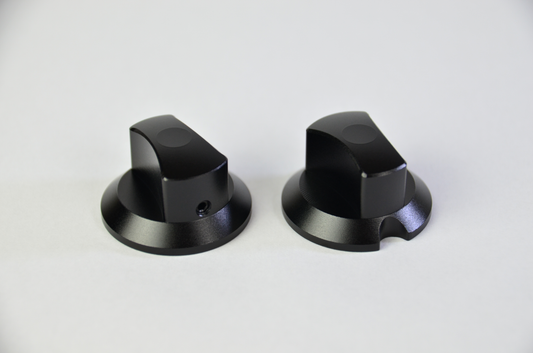 Two black anodized aluminium rotary knobs for sim racing DIY project.