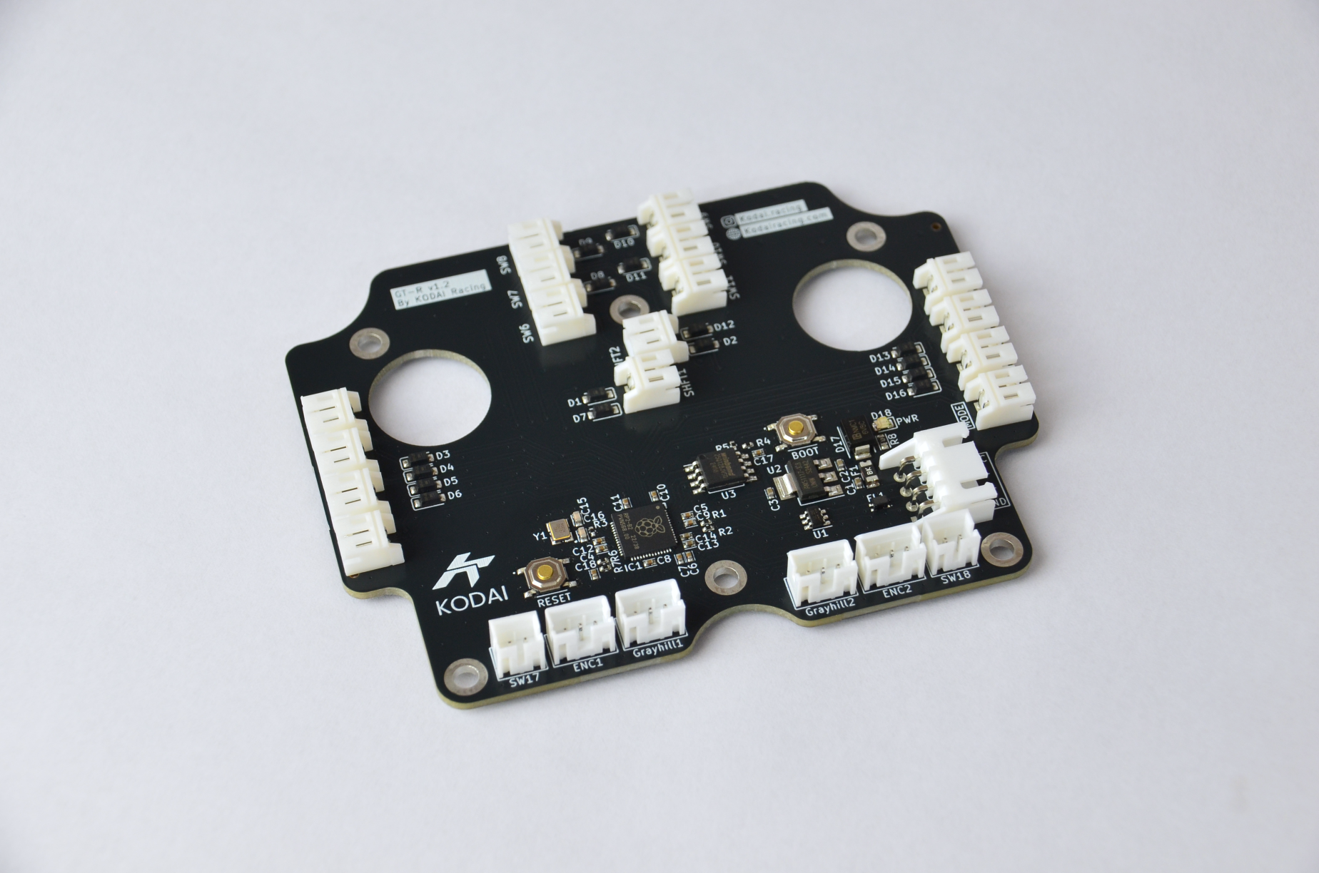 Custom PCB for GT-R DIY project with various electronic components and connection ports visible.