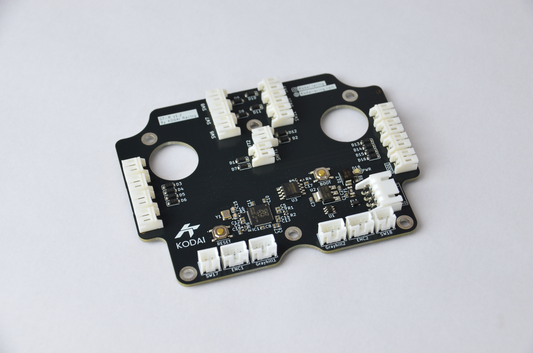 Custom PCB for GT-R DIY project with various electronic components and connection ports visible.