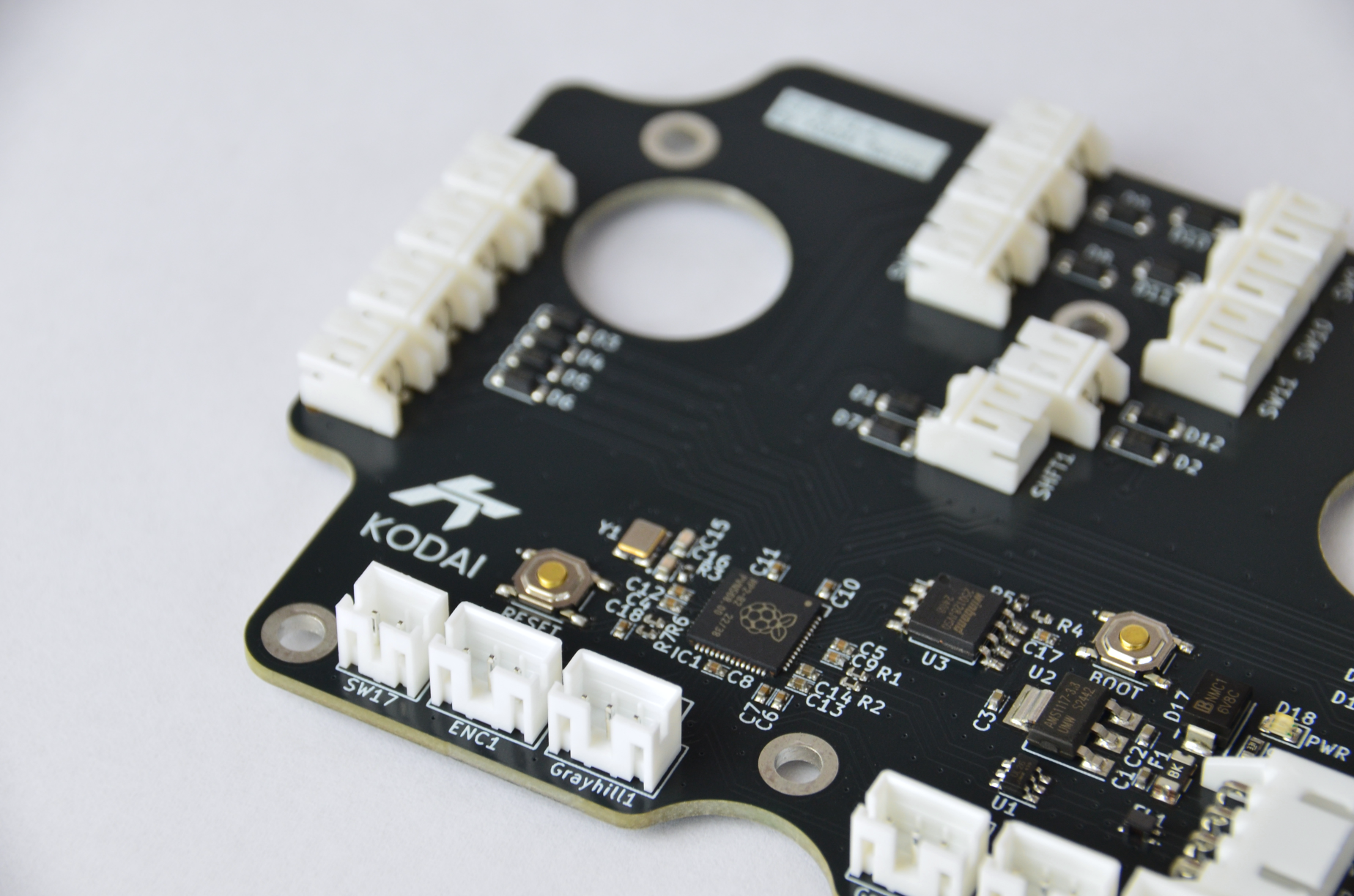 Custom PCB for GT-R DIY project with various electronic components and connection ports visible. Close up view.