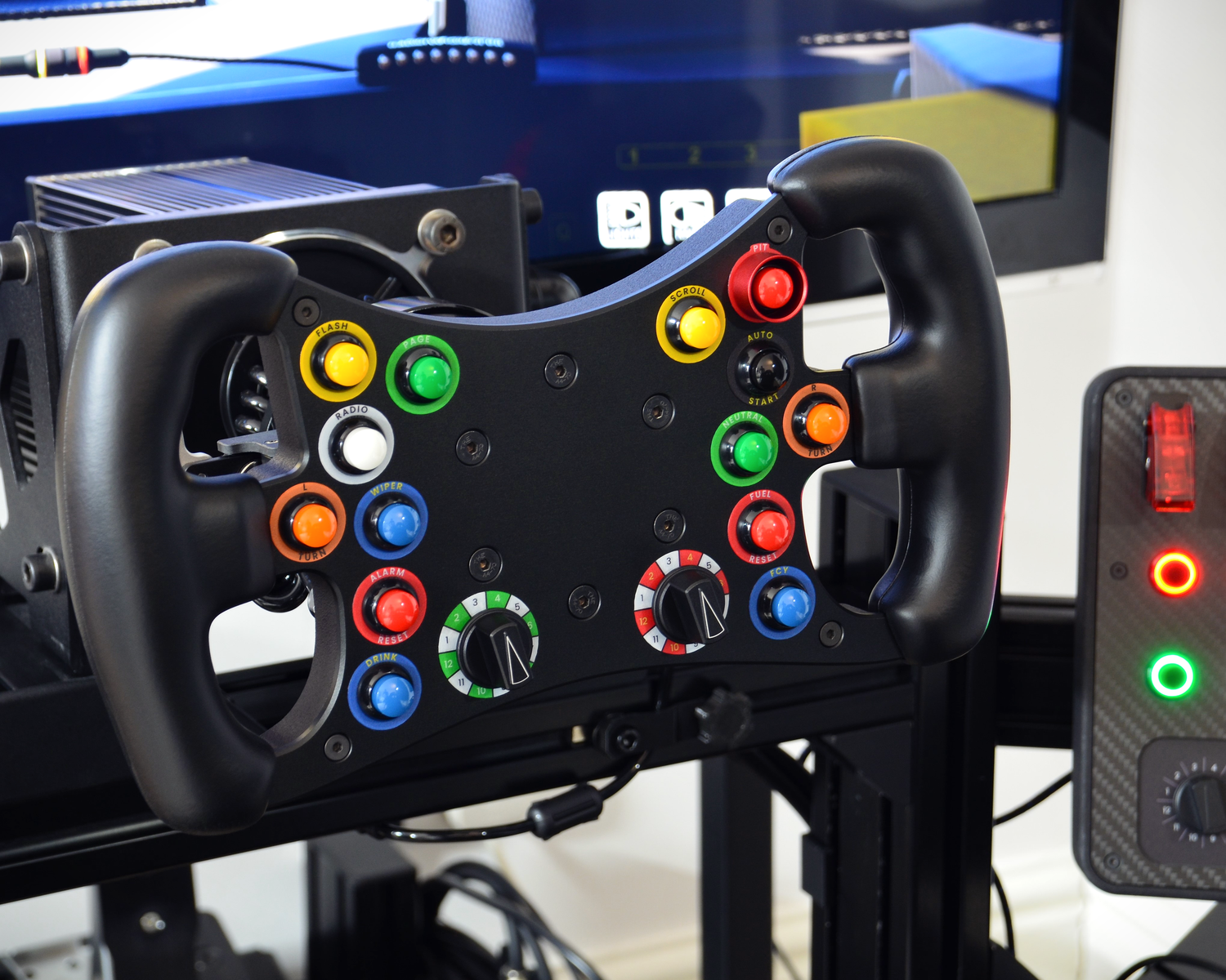 GT-R sim racing wheel mounted on DIY rig setup