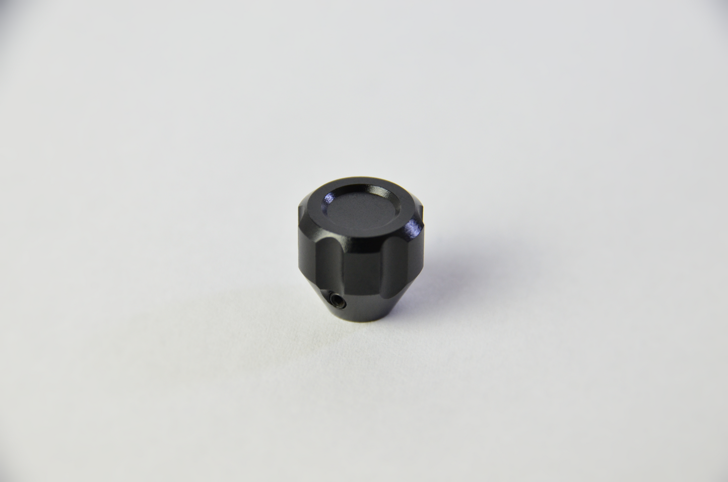 Black anodized aluminium switch knobs for sim racing DIY projects. Front view.