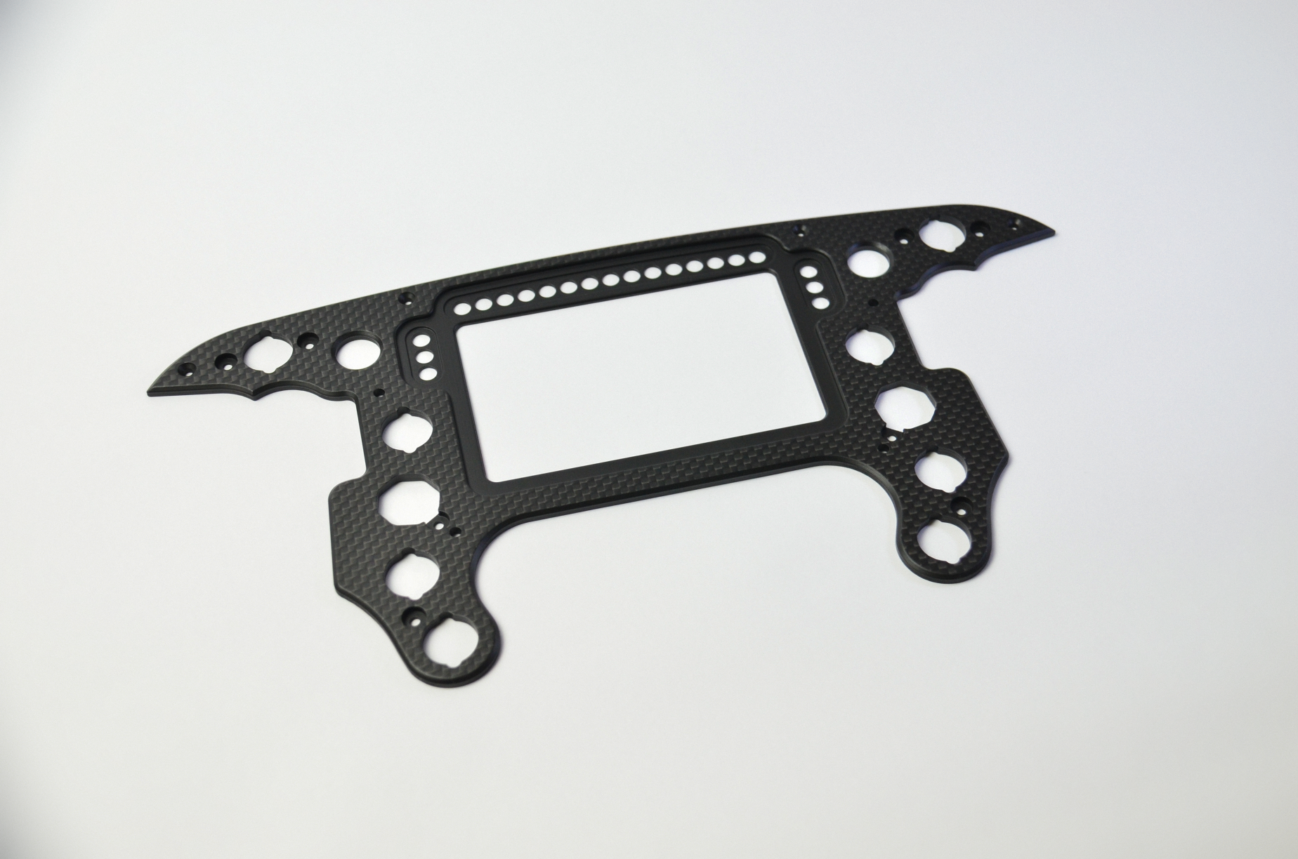 CNC-machined matte carbon fiber plates for DIY sim racing projects, lightweight and high-quality components