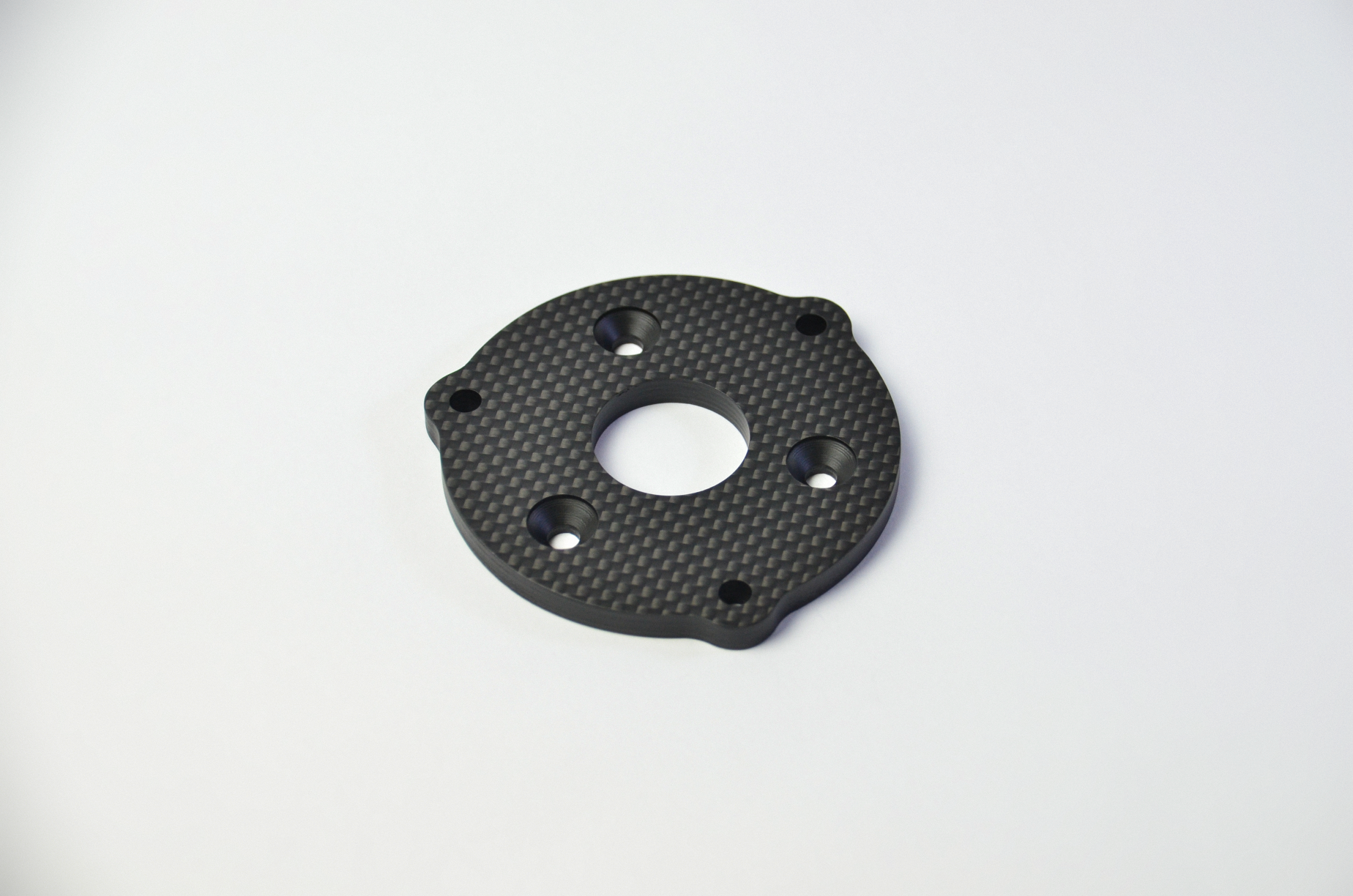 CNC-machined matte carbon fiber plates for DIY sim racing projects, lightweight and high-quality components