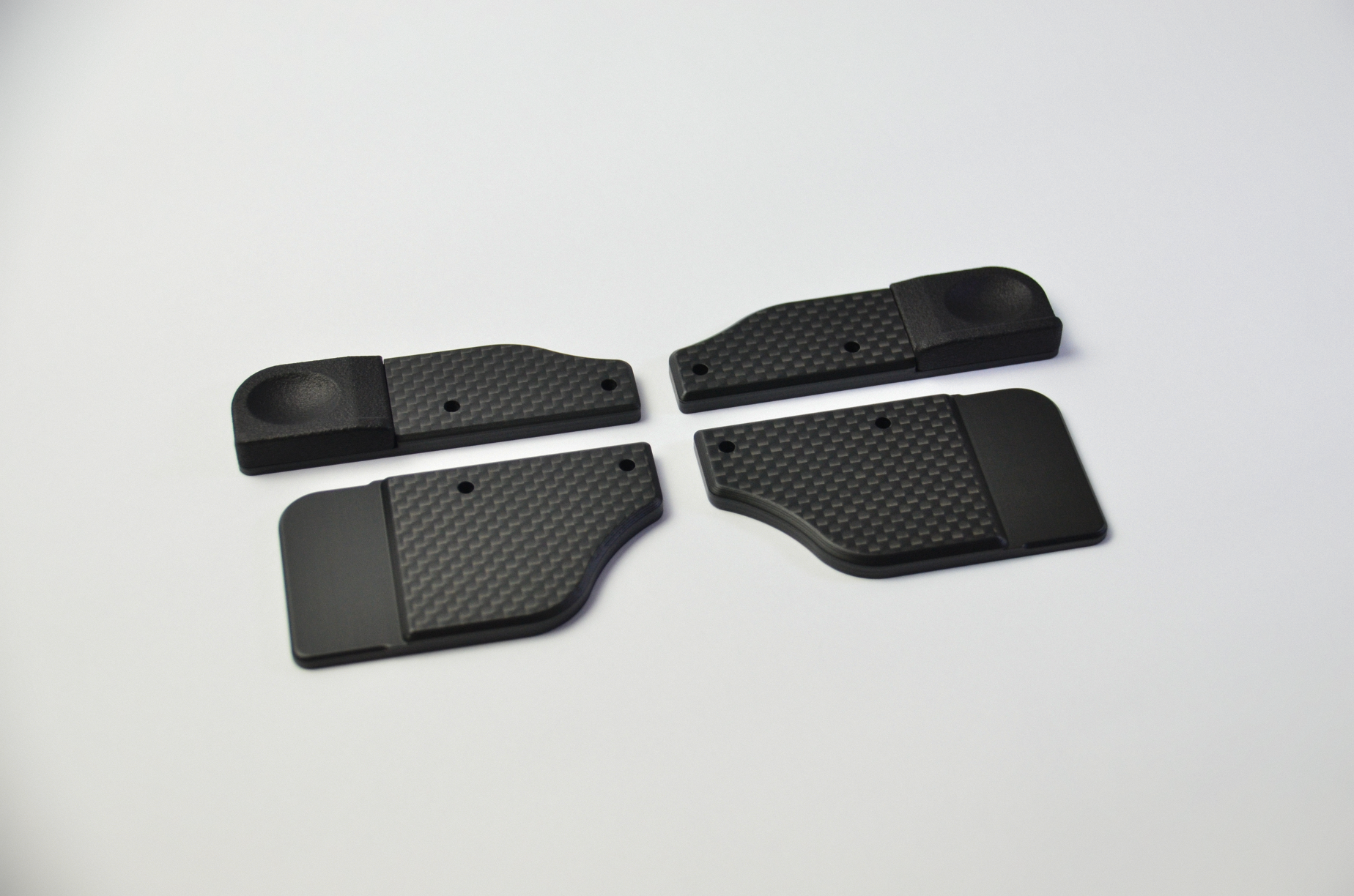 CNC-machined matte carbon fiber plates for DIY sim racing projects, lightweight and high-quality components