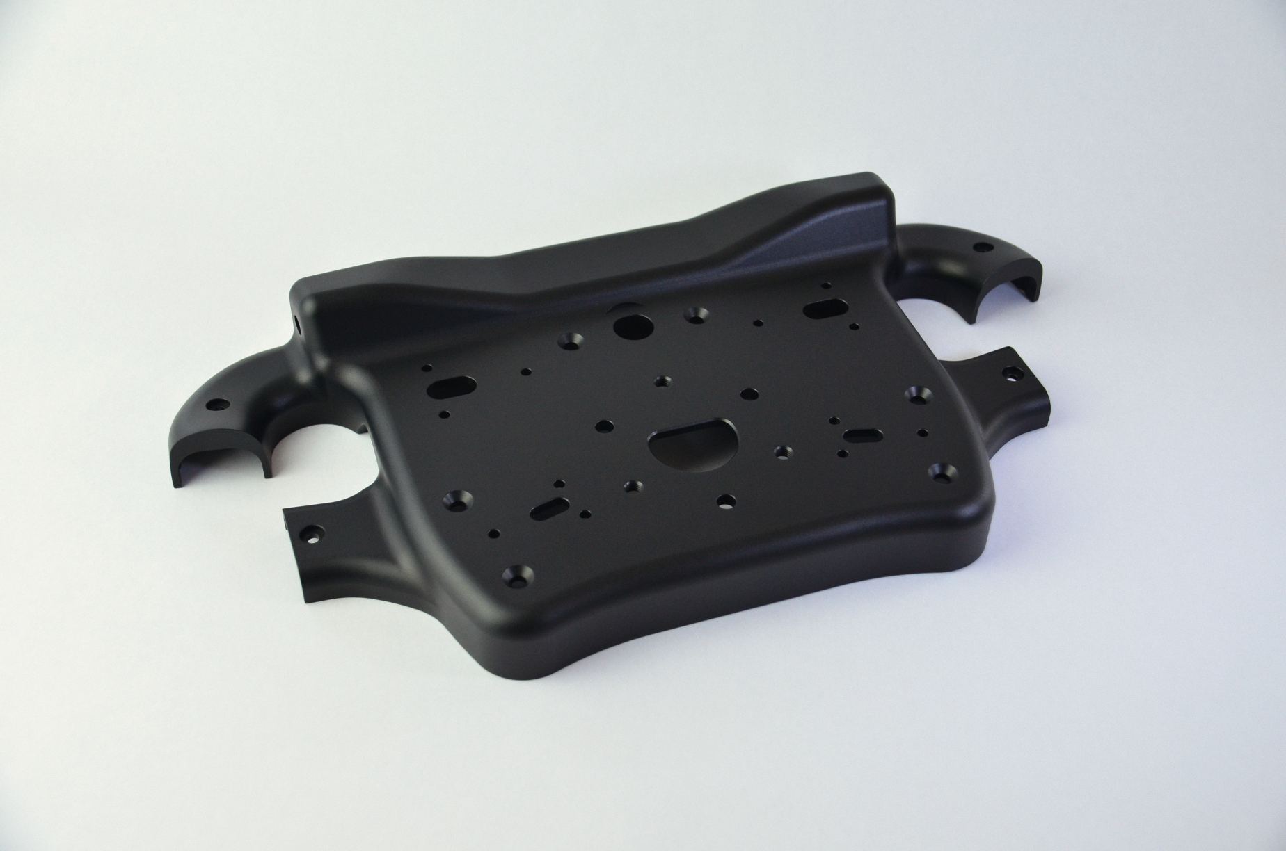 CNC machined aluminium rear enclosure with black anodized finish, designed for the MF1 DIY sim racing wheel.