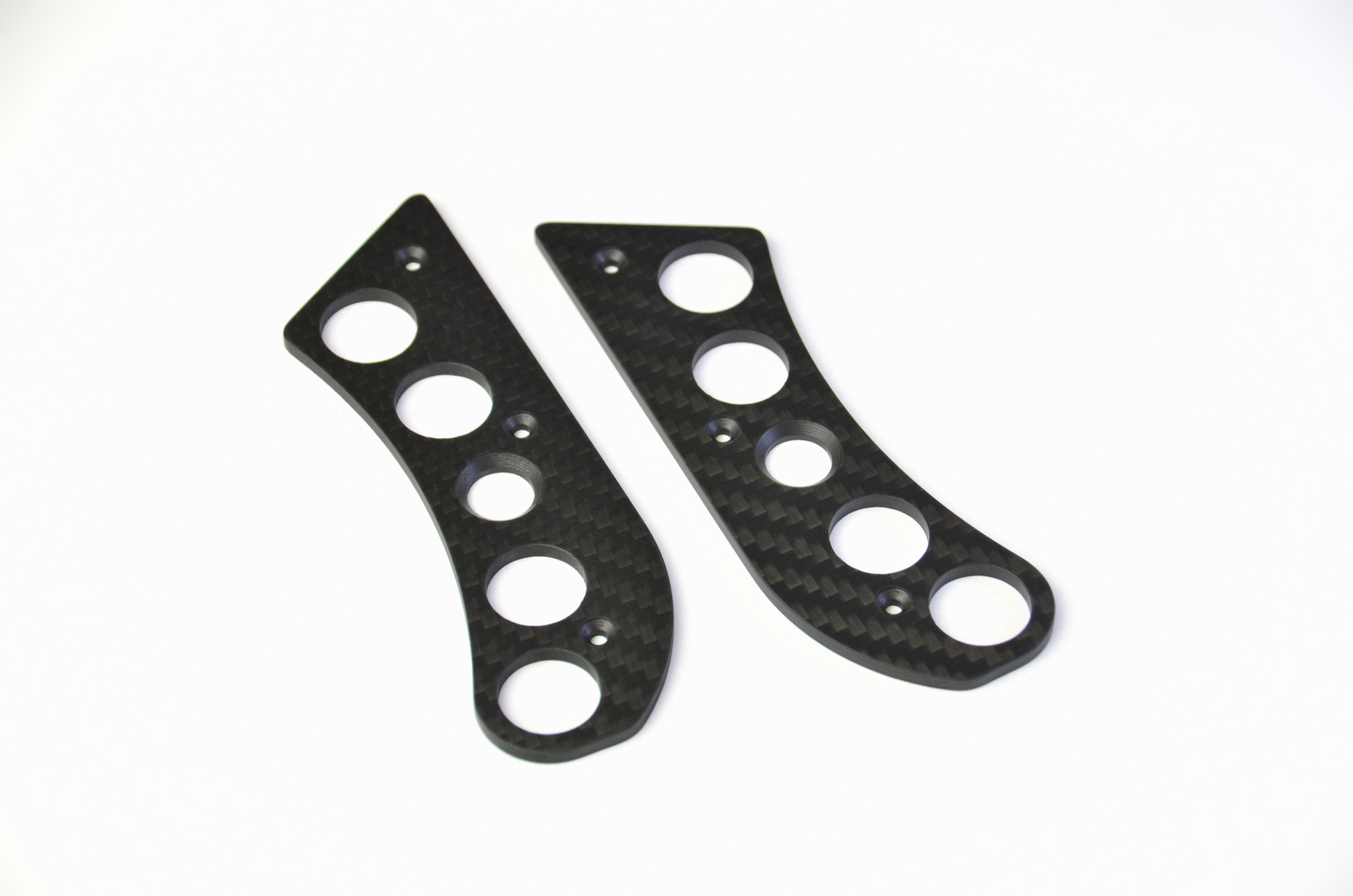 CNC-machined matte carbon fiber plates for DIY sim racing projects, lightweight and high-quality components