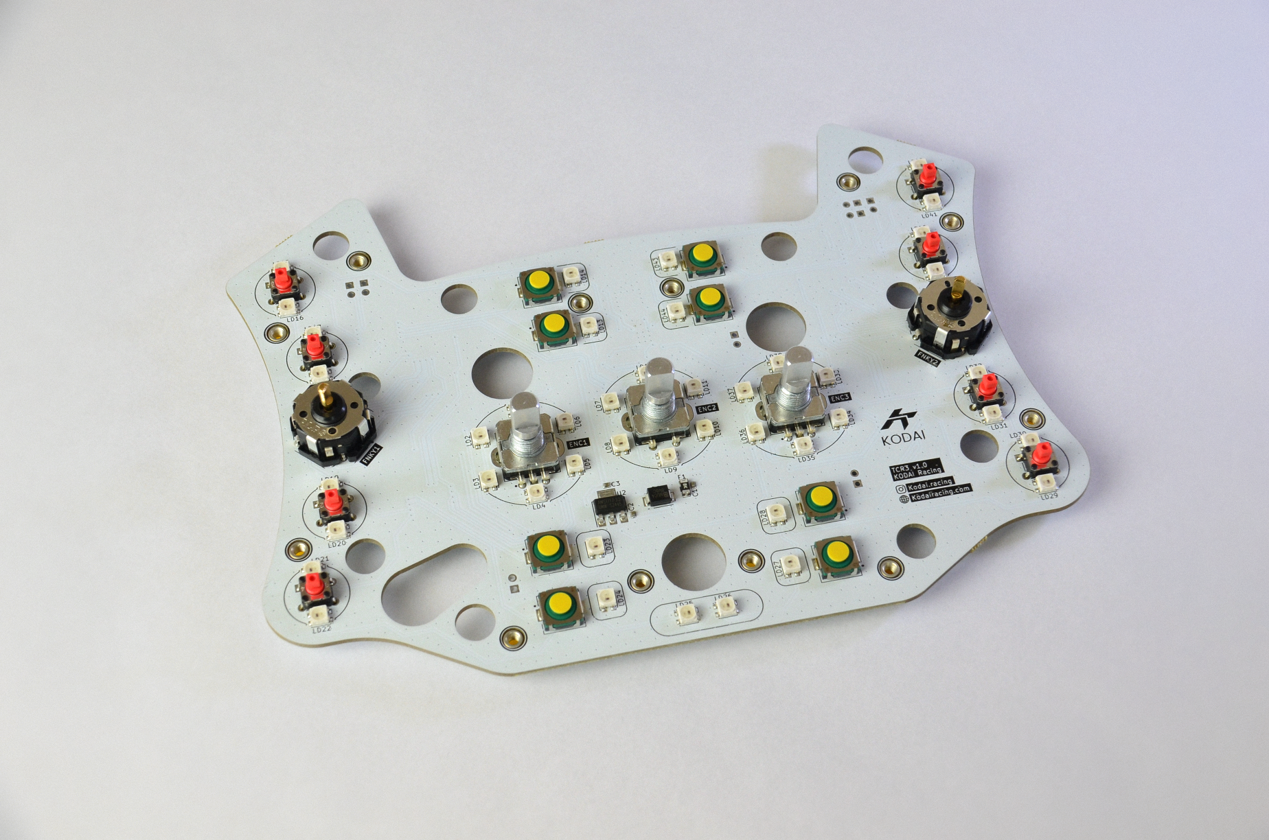 Custom PCB for TCR3 DIY sim racing project with various electronic components and connection ports visible. Front view.