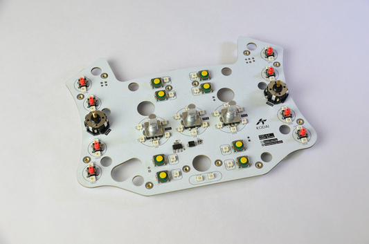 Custom PCB for TCR3 DIY sim racing project with various electronic components and connection ports visible. Front view.