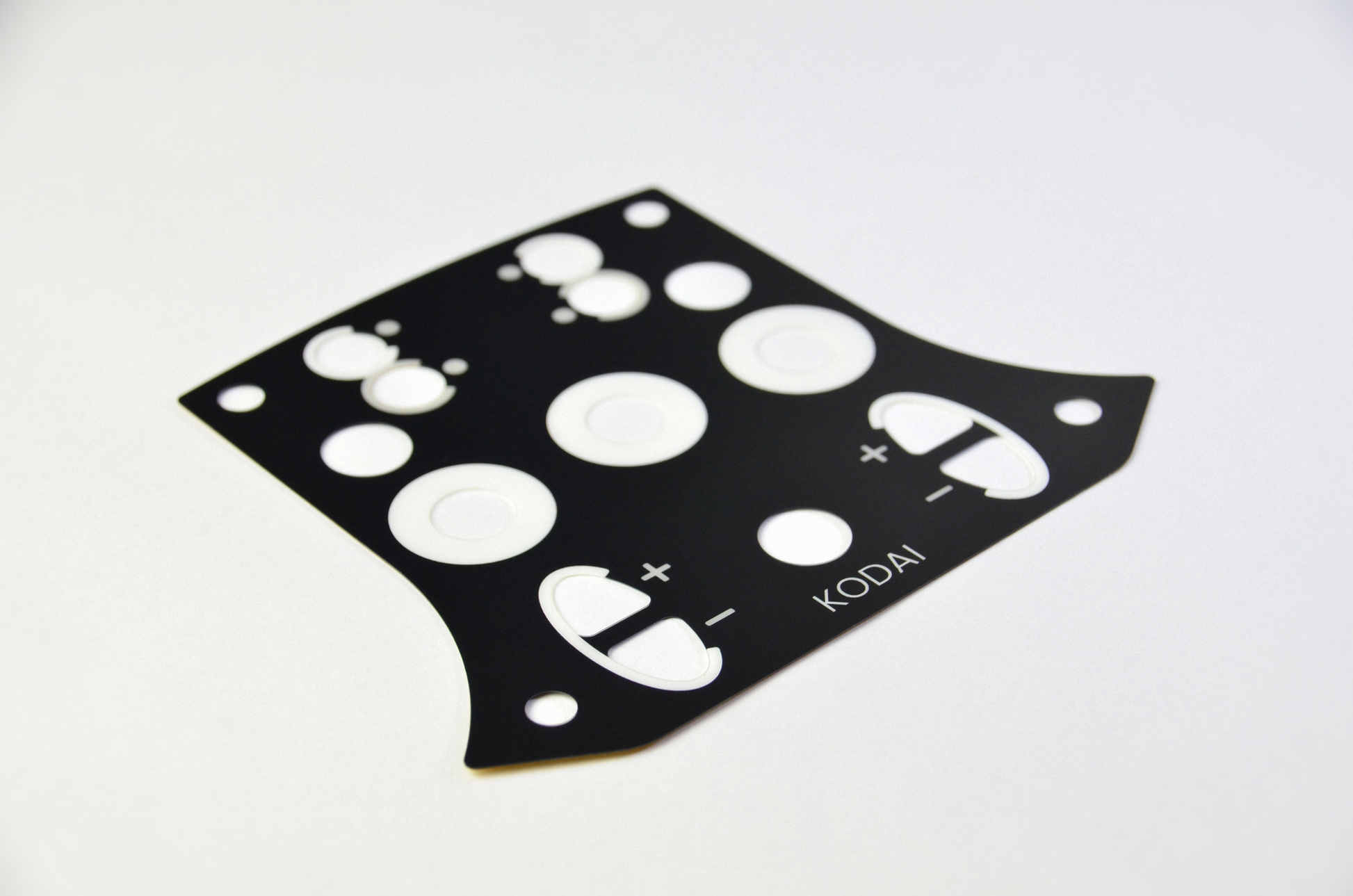 TCR3 PET decal sheet for high-quality sim racing button plate customization, durable and precise overlay. Side view.