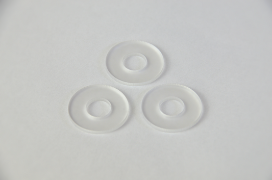 Three frosted plexiglass diffusers arranged in a triangular formation on a white background.