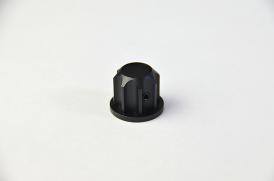 A black anodized aluminium rotary knob designed for use with the TCR3 DIY project. Front view.