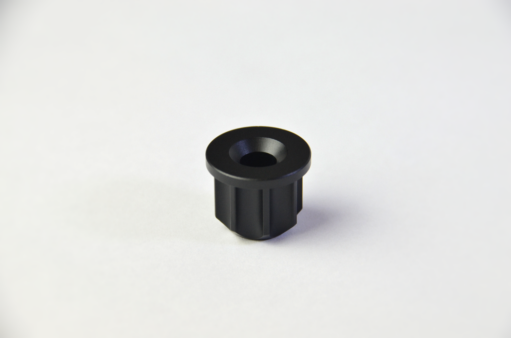 A black anodized aluminium rotary knob designed for use with the TCR3 DIY project. Rear view.