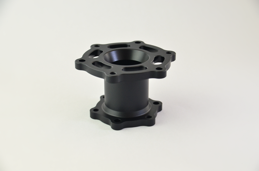 Precision CNC-machined anodized aluminium spacer for sim racing wheels and quick release mounts.