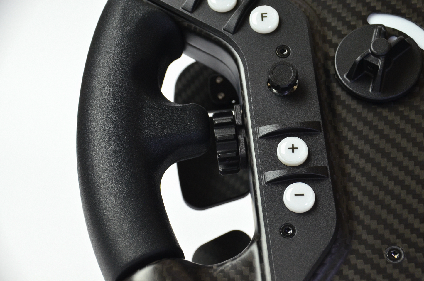 High-end AM2 GT sim racing wheel with rotary encoders, paddles, and RGB buttons. Aluminium and carbon fibre.