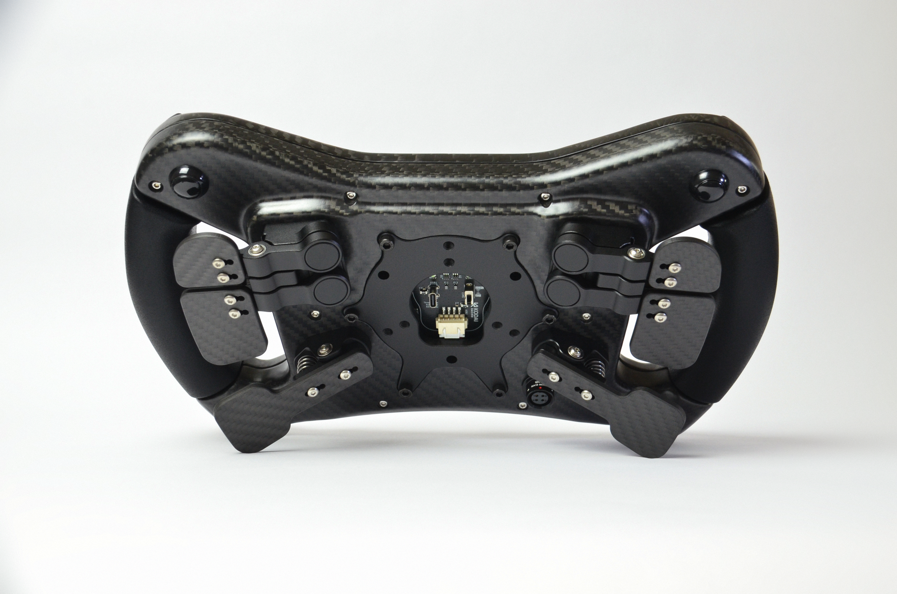 High-end AM2 GT sim racing wheel with rotary encoders, paddles, and RGB buttons. Aluminium and carbon fibre.