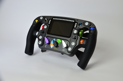 High-end MF1 Formula sim racing wheel with rotary encoders, paddles, and RGB buttons. Aluminium and carbon fibre.