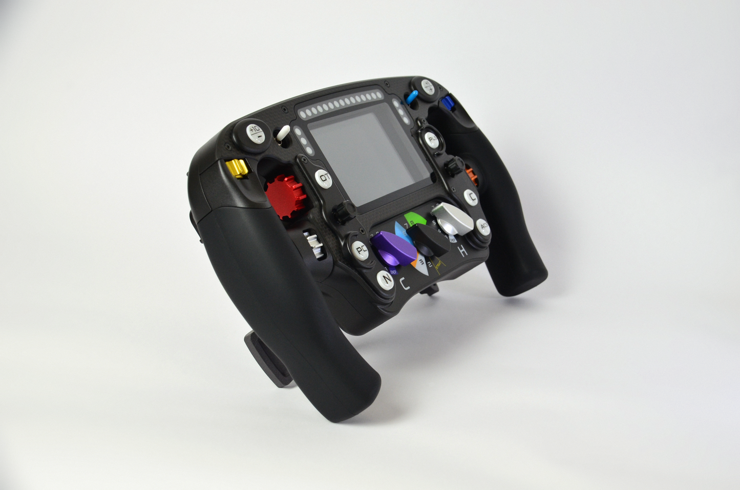 High-end MF1 Formula sim racing wheel with rotary encoders, paddles, and RGB buttons. Aluminium and carbon fibre.