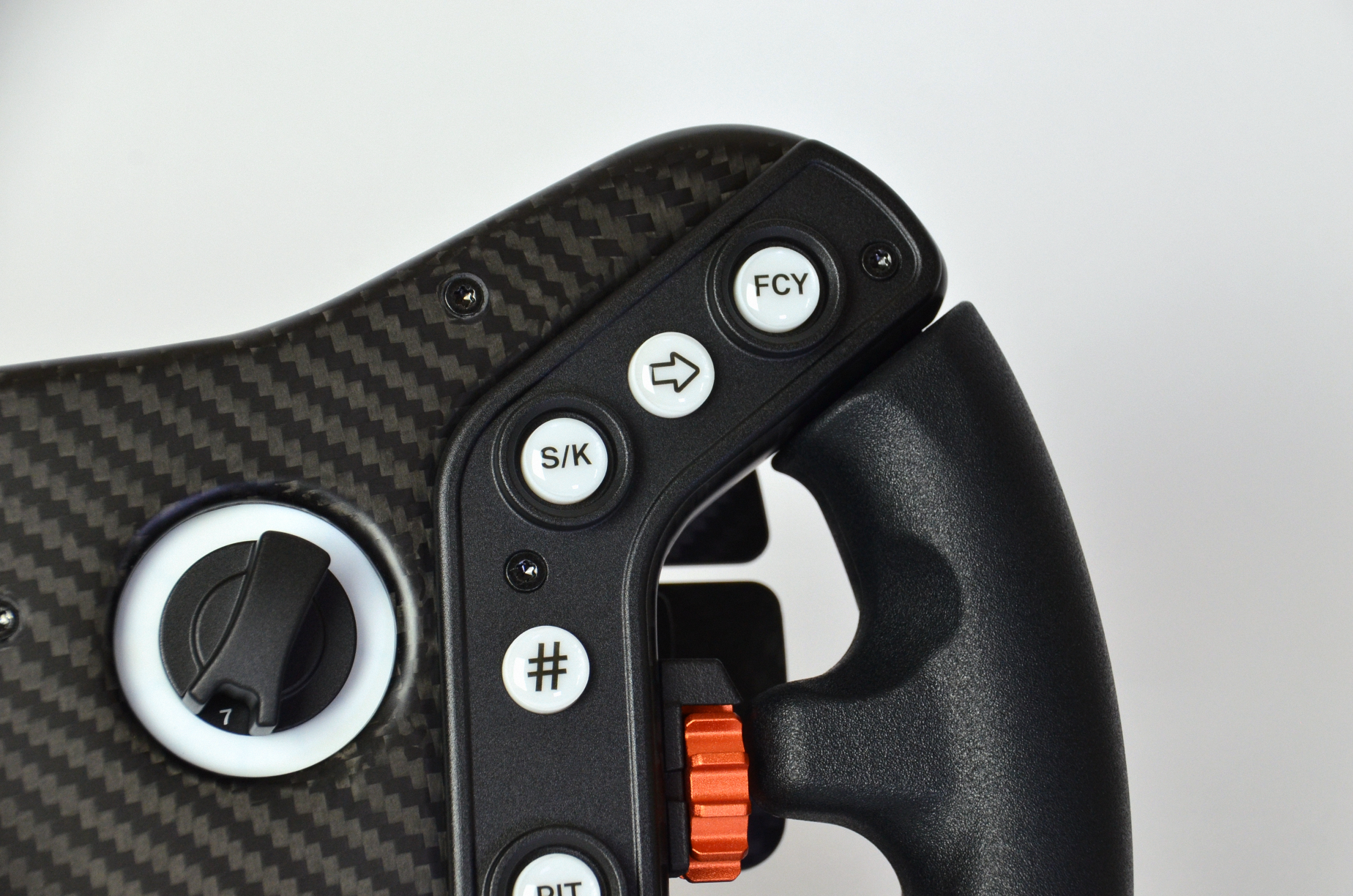 High-end GZ GT sim racing wheel with rotary encoders, paddles, and RGB buttons. Aluminium and carbon fibre.