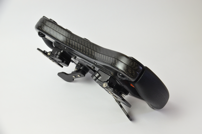 High-end GZ GT sim racing wheel with rotary encoders, paddles, and RGB buttons. Aluminium and carbon fibre.