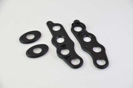 CNC machined aluminium button surrounds with a black anodized finish, designed for the MF1 DIY sim racing wheel.