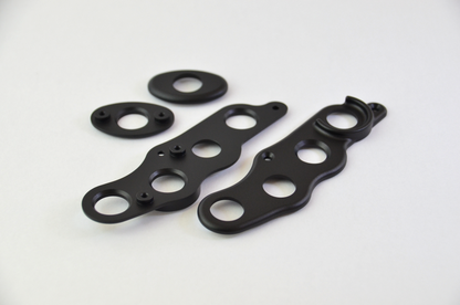 CNC machined aluminium button surrounds with a black anodized finish, designed for the MF1 DIY sim racing wheel.